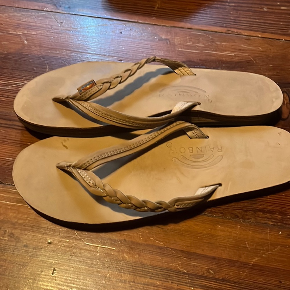 Tan flips flops